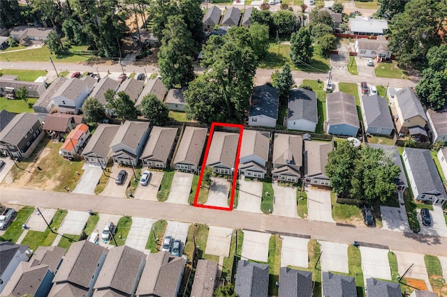 16887 Balmoral St, Montgomery, TX 77316 - aerial view of property and surrounding area with nearby suburban area and property parcel outlined
