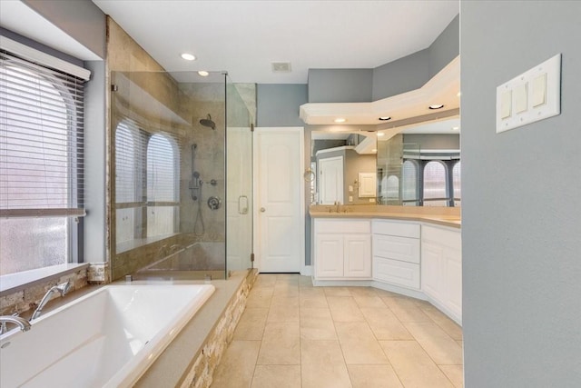 5822 Bailey Springs Ct, Katy, TX 77450 - bathroom with a shower stall, vanity, a garden tub, tile patterned floors, and recessed lighting