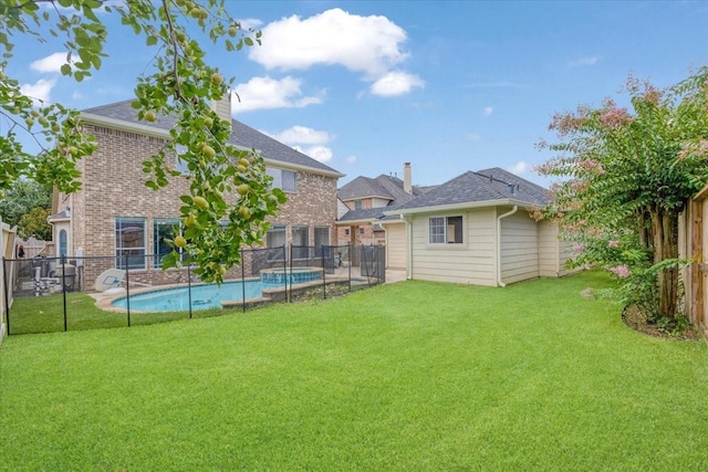 5822 Bailey Springs Ct, Katy, TX 77450 - fenced backyard featuring a pool with connected hot tub