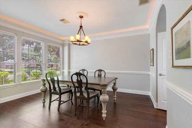 5822 Bailey Springs Ct, Katy, TX 77450 - dining room with a chandelier, ornamental molding, and wood finished floors