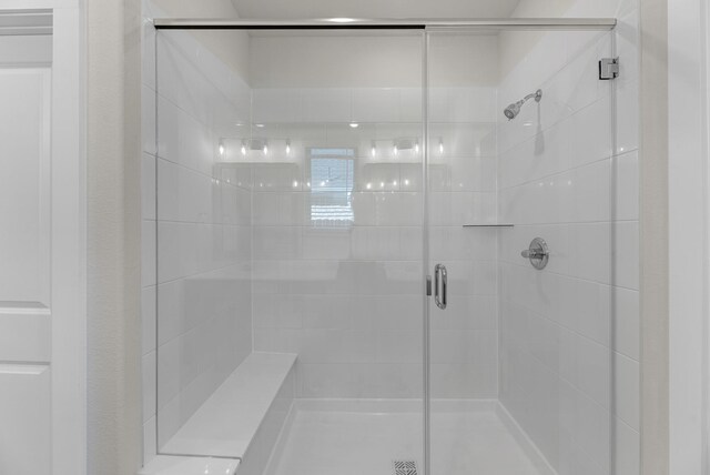 21624 Alberta Forest Cir, Magnolia, TX 77355 - full bathroom featuring a shower stall