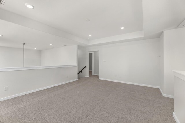 21624 Alberta Forest Cir, Magnolia, TX 77355 - unfurnished room with recessed lighting, light carpet, and a tray ceiling