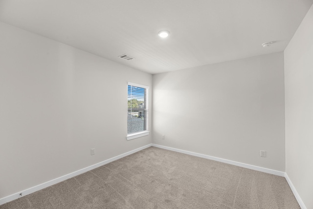 21624 Alberta Forest Cir, Magnolia, TX 77355 - unfurnished room featuring carpet floors, recessed lighting, and a smoke detector