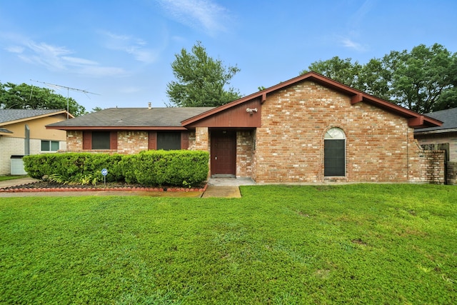 9506 Kell Cir, Houston, TX 77040 - view of front of home with brick siding and a front yard
