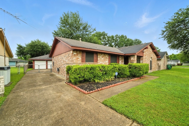 9506 Kell Cir, Houston, TX 77040 - ranch-style house with a gate, a detached garage, brick siding, and a shingled roof
