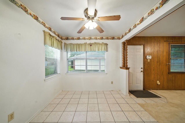 9506 Kell Cir, Houston, TX 77040 - entrance foyer with wooden walls and ceiling fan