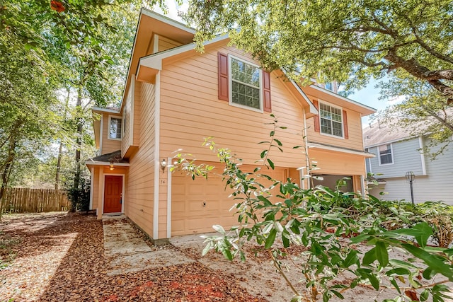 14 Scenic Brook Ct, The Woodlands, TX 77382 - view of home's exterior with a garage