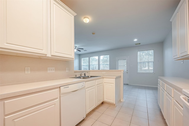14 Scenic Brook Ct, The Woodlands, TX 77382 - kitchen with dishwasher, light tile patterned floors, a peninsula, plenty of natural light, and recessed lighting