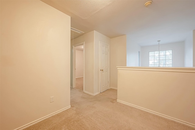 14 Scenic Brook Ct, The Woodlands, TX 77382 - spare room with light carpet and a smoke detector