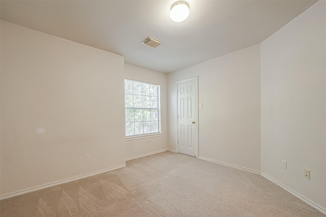 14 Scenic Brook Ct, The Woodlands, TX 77382 - unfurnished room featuring light colored carpet