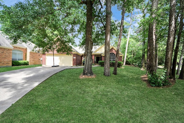 70 N Lace Arbor Dr, The Woodlands, TX 77382 - view of front of property with concrete driveway, brick siding, a front lawn, and a garage