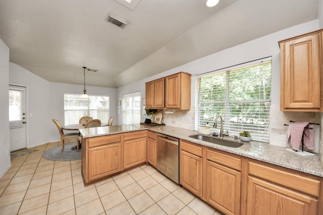 70 N Lace Arbor Dr, The Woodlands, TX 77382 - kitchen featuring dishwasher, vaulted ceiling, a peninsula, light tile patterned floors, and tasteful backsplash
