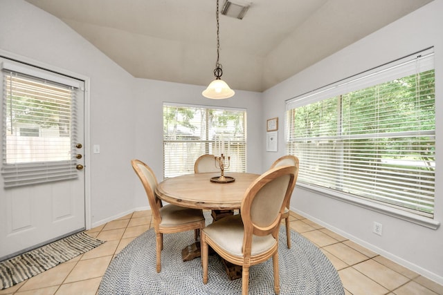 70 N Lace Arbor Dr, The Woodlands, TX 77382 - dining space featuring vaulted ceiling and light tile patterned flooring