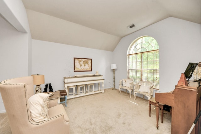 70 N Lace Arbor Dr, The Woodlands, TX 77382 - sitting room featuring vaulted ceiling and carpet