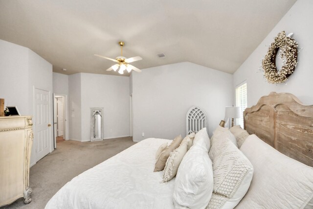 70 N Lace Arbor Dr, The Woodlands, TX 77382 - bedroom featuring light colored carpet, vaulted ceiling, and ceiling fan