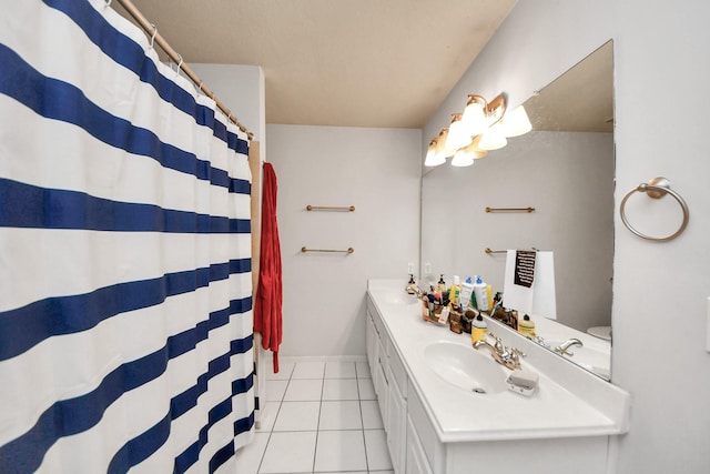 70 N Lace Arbor Dr, The Woodlands, TX 77382 - bathroom featuring double vanity and tile patterned flooring