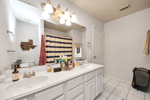 70 N Lace Arbor Dr, The Woodlands, TX 77382 - full bathroom with double vanity, tile patterned floors, and a shower with curtain