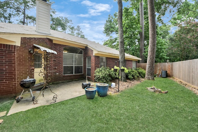 70 N Lace Arbor Dr, The Woodlands, TX 77382 - fenced backyard featuring a patio