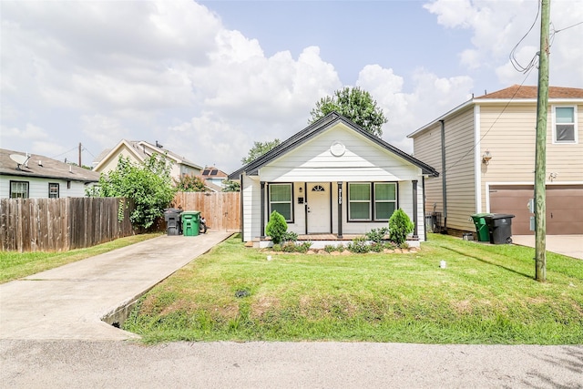 2120 Yates St, Houston, TX 77020 - view of front of home with driveway and a porch