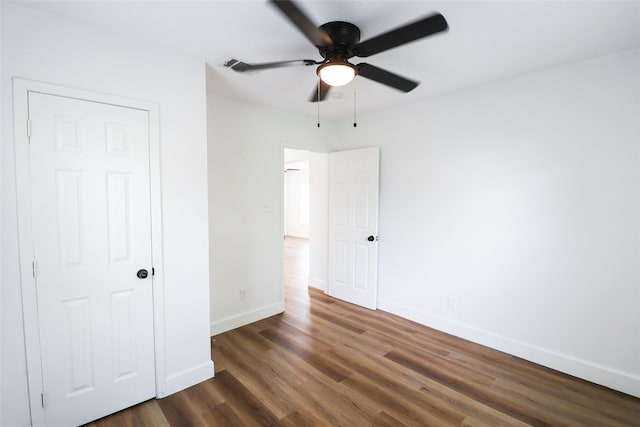 2120 Yates St, Houston, TX 77020 - unfurnished bedroom featuring wood finished floors and a ceiling fan