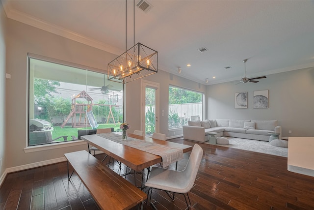 4006 Lanark Ln, Houston, TX 77025 - dining room with crown molding, ceiling fan, dark wood-style floors, a chandelier, and recessed lighting