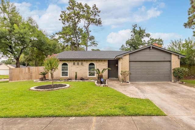 2807 Canary Ln, Humble, TX 77396 - view of front of home featuring brick siding, concrete driveway, and a garage