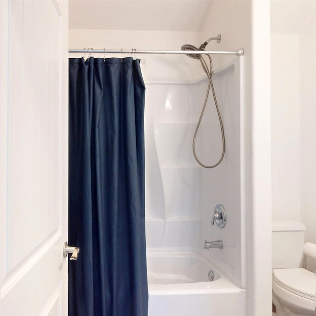 17315 Cumberland Park Ln, Humble, TX 77346 - bathroom with toilet and shower / bath combination with curtain