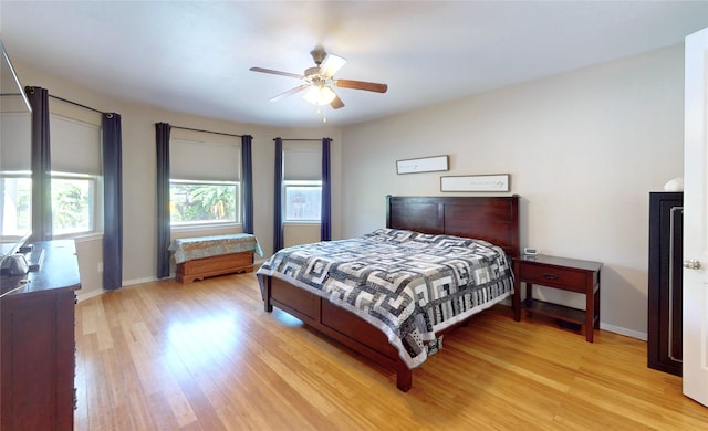 17315 Cumberland Park Ln, Humble, TX 77346 - bedroom featuring light wood-type flooring and a ceiling fan