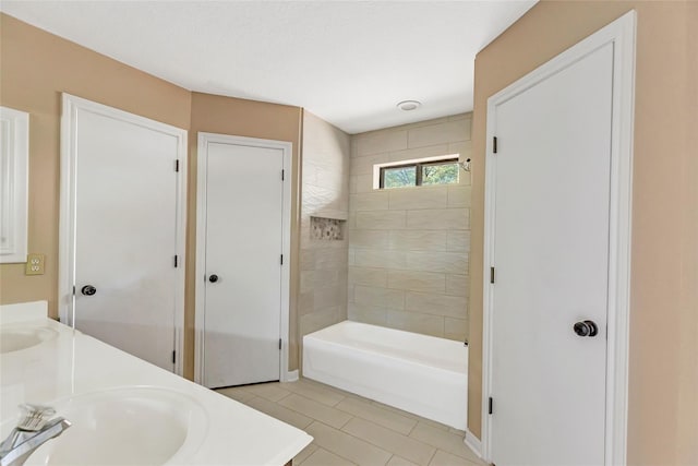 507 Odessa Dr, Magnolia, TX 77354 - full bath featuring double vanity, tile patterned flooring, and shower / tub combination