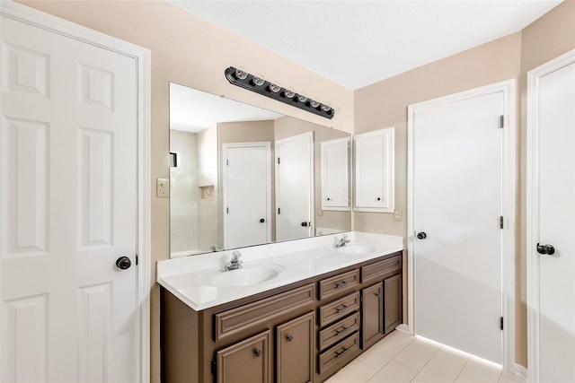 507 Odessa Dr, Magnolia, TX 77354 - full bath with double vanity and tile patterned floors