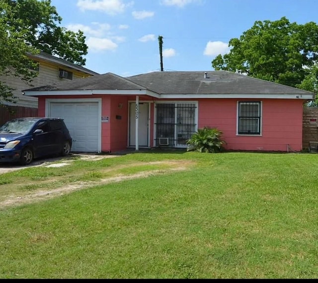5305 Rapido Rd, Houston, TX 77033 - ranch-style home with a garage, a front yard, and driveway