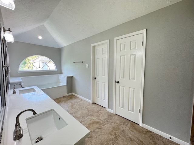 4607 Blue Rose Cir, Missouri City, TX 77459 - washroom with a sink and a textured ceiling
