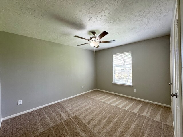 4607 Blue Rose Cir, Missouri City, TX 77459 - carpeted spare room featuring ceiling fan and a textured ceiling