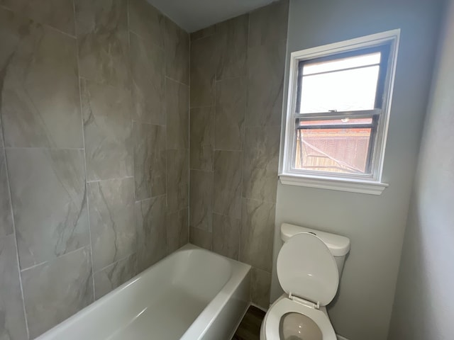7726 Ashmole Ln, Houston, TX 77088 - bathroom featuring toilet and  shower combination