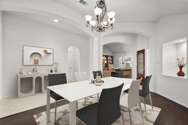 11047 Pierce Valley Dr, Richmond, TX 77406 - dining room with arched walkways, lofted ceiling, a chandelier, and recessed lighting