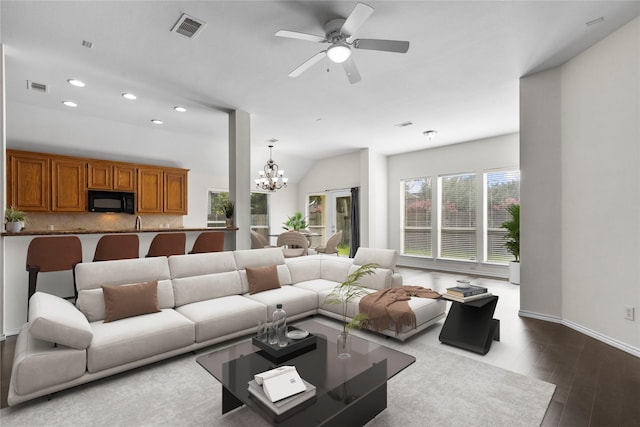11047 Pierce Valley Dr, Richmond, TX 77406 - living area with a chandelier, recessed lighting, a ceiling fan, dark wood-style floors, and vaulted ceiling