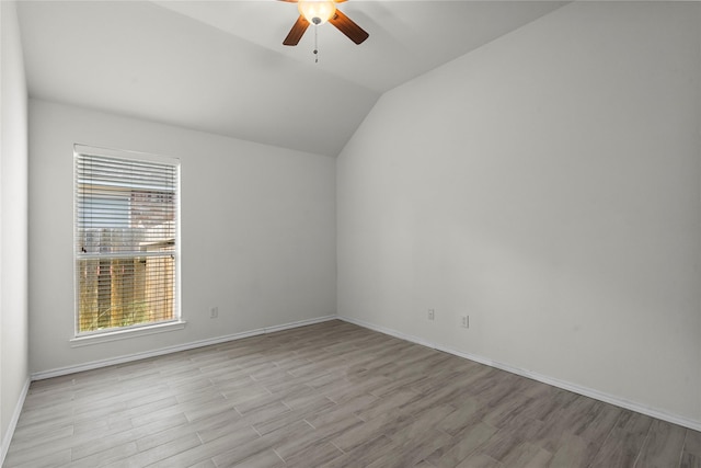 11047 Pierce Valley Dr, Richmond, TX 77406 - unfurnished room with ceiling fan, light wood-style flooring, vaulted ceiling, and healthy amount of natural light