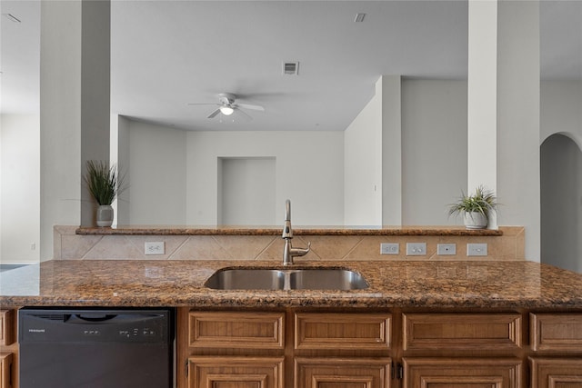 11047 Pierce Valley Dr, Richmond, TX 77406 - kitchen featuring dishwasher, a ceiling fan, and dark stone countertops