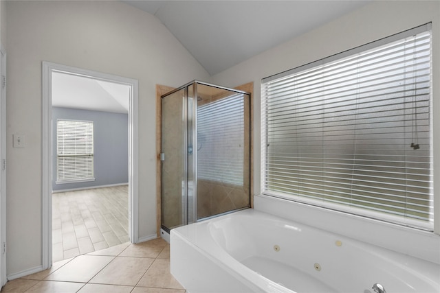 11047 Pierce Valley Dr, Richmond, TX 77406 - full bathroom with a jetted tub, a shower stall, vaulted ceiling, and tile patterned floors