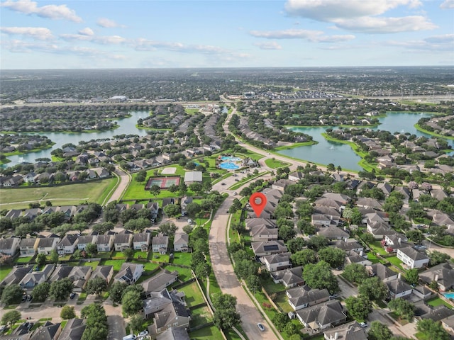 11047 Pierce Valley Dr, Richmond, TX 77406 - aerial overview of property's location with nearby suburban area and a large body of water