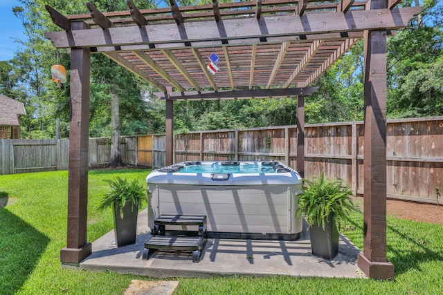 18774 Monetta Dr, New Caney, TX 77357 - fenced backyard with a hot tub, a pergola, and a patio