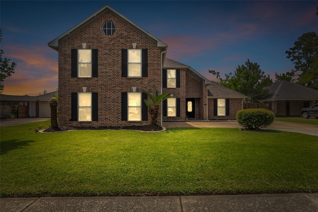 2504 Leroy St, Pearland, TX 77581 - traditional home featuring a yard and brick siding