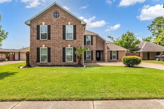 2504 Leroy St, Pearland, TX 77581 - view of front of house with brick siding and a front lawn