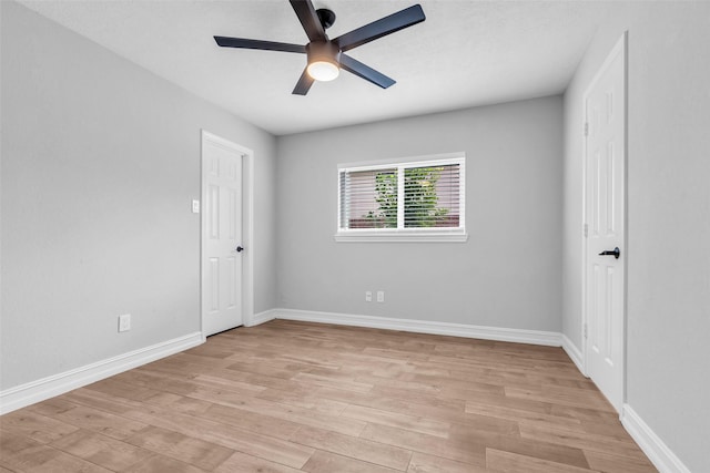 2504 Leroy St, Pearland, TX 77581 - empty room with light wood finished floors and ceiling fan