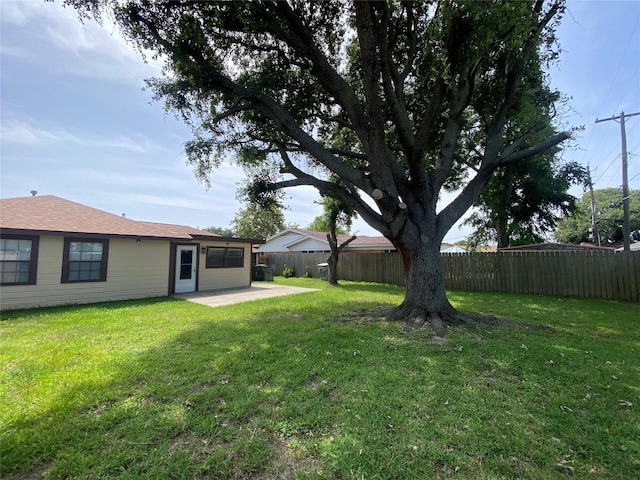 2512 Pine St, Galveston, TX 77551 - fenced backyard with a patio