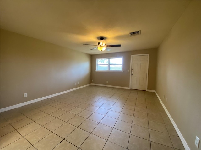 2512 Pine St, Galveston, TX 77551 - unfurnished room with ceiling fan and light tile patterned floors