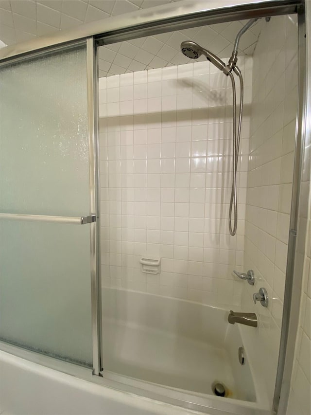 2512 Pine St, Galveston, TX 77551 - bathroom with combined bath / shower with glass door