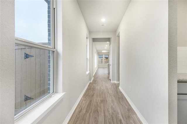 828 Laguna Green Ln, Katy, TX 77493 - hallway with wood finished floors and baseboards