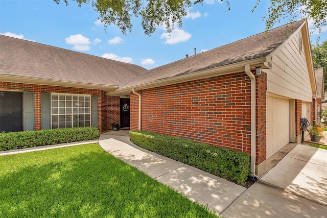 3310 Country Meadows Ct, Pearland, TX 77584 - view of front of house featuring brick siding, a garage, a front yard, driveway, and roof with shingles