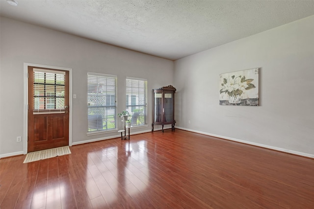 3310 Country Meadows Ct, Pearland, TX 77584 - unfurnished room with wood finished floors and a textured ceiling
